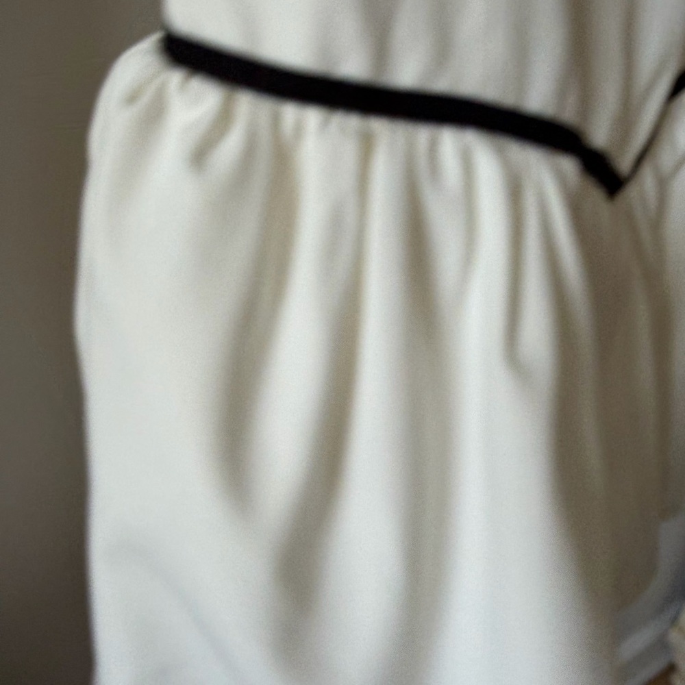 Sleeveless White Mini Dress with Black Trim - Picture 7 of 12